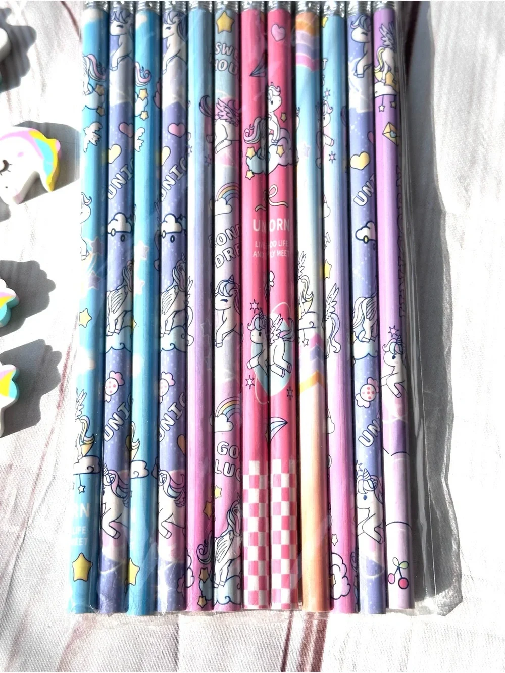 12 Rainbow Unicorn Pencil Set with Pastel Designs and Eraser Toppers